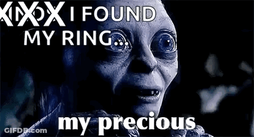 A Close Up Of A Person 'S Face With The Words `` I Found My Ring , My Precious '' . GIF