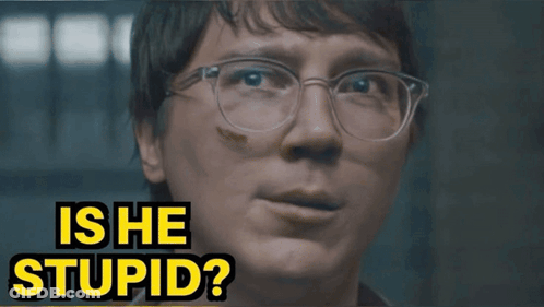 A Close Up Of A Person 'S Face With The Words Is He Stupid Above It GIF