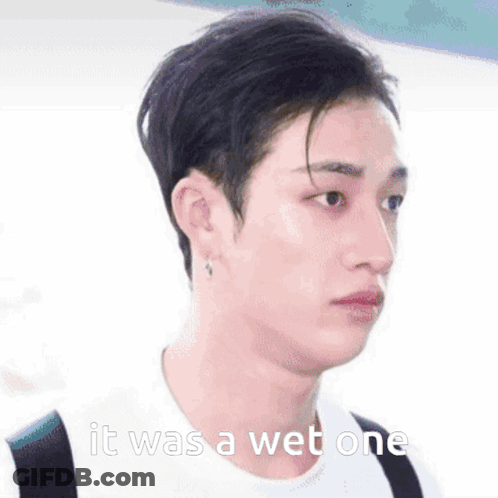 A Close Up Of A Person 'S Face With The Words `` It Was A Wet One '' Written On The Bottom . GIF
