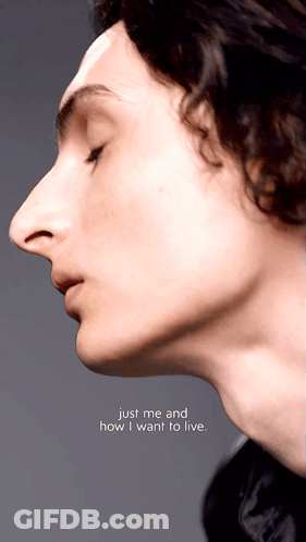 A Close Up Of A Person 'S Face With The Words Just Me And How I Want To Live GIF