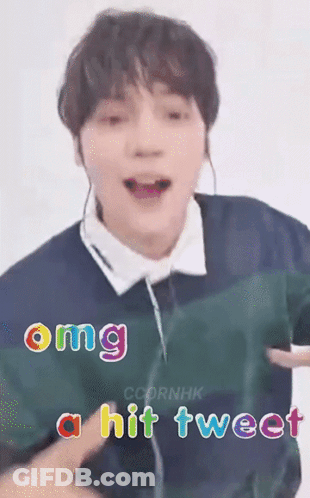 A Close Up Of A Person 'S Face With The Words `` Omg A Hit Tweet '' Written Above It . GIF
