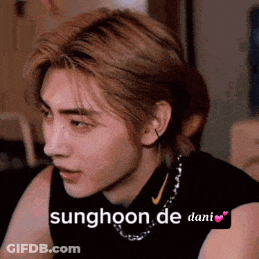 A Close Up Of A Person 'S Face With The Words Sunghoon De Dani GIF