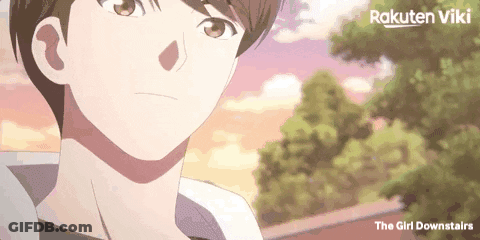 A Close Up Of A Person 'S Face With The Words " The Girl Downstairs " Below It GIF