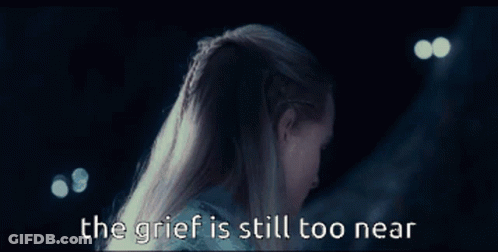 A Close Up Of A Person 'S Face With The Words The Grief Is Still Too Near GIF