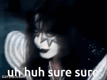 A Close Up Of A Person 'S Face With The Words `` Uh Huh Sure Sure '' . GIF