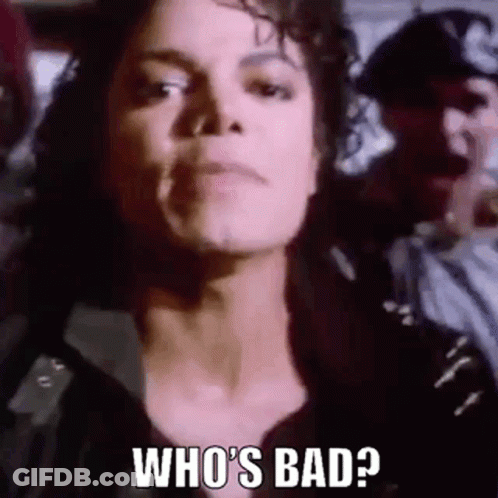 A Close Up Of A Person 'S Face With The Words `` Who 'S Bad ? '' GIF