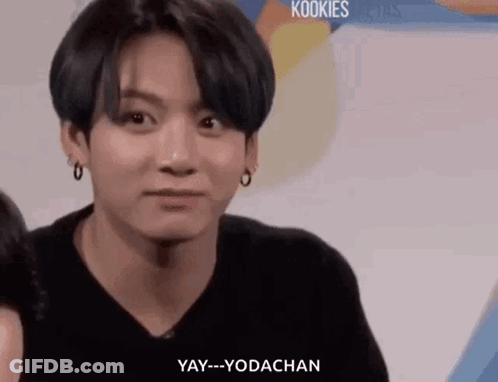 A Close Up Of A Person 'S Face With The Words `` Yay-Yodachan '' Written On It . GIF
