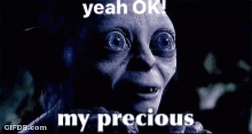 A Close Up Of A Person 'S Face With The Words Yeah Ok My Precious On It GIF