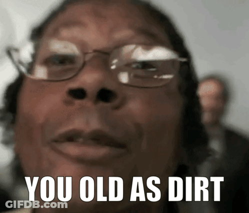 A Close Up Of A Person 'S Face With The Words " You Old As Dirt " On It GIF