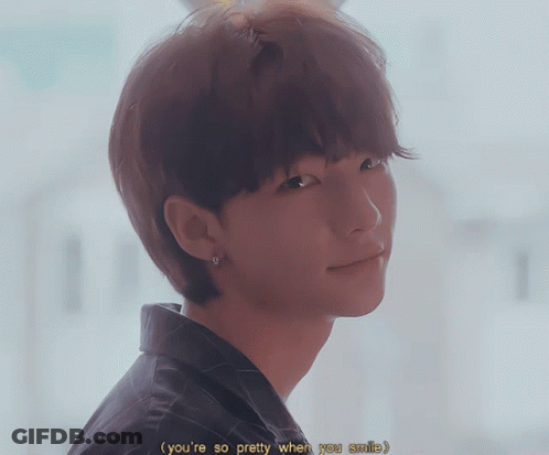 A Close Up Of A Person 'S Face With The Words " You 'Re So Pretty When You Smile " GIF