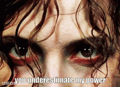 A Close Up Of A Person 'S Face With The Words " You Underestimate My Power " Above It GIF