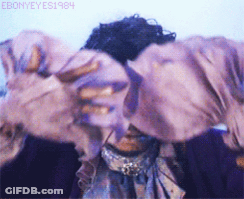 A Close Up Of A Person 'S Face With The Year 1984 On The Bottom Left GIF