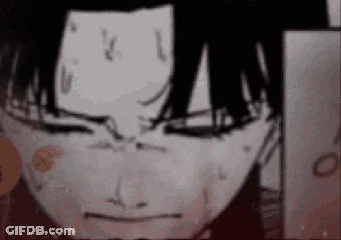 A Close Up Of A Person 'S Face With Their Eyes Closed And A Red Spot On Their Forehead . GIF