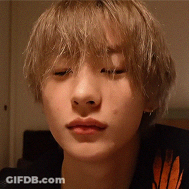 Close Up Of Blonde-Haired Person With Eyes Closed GIF