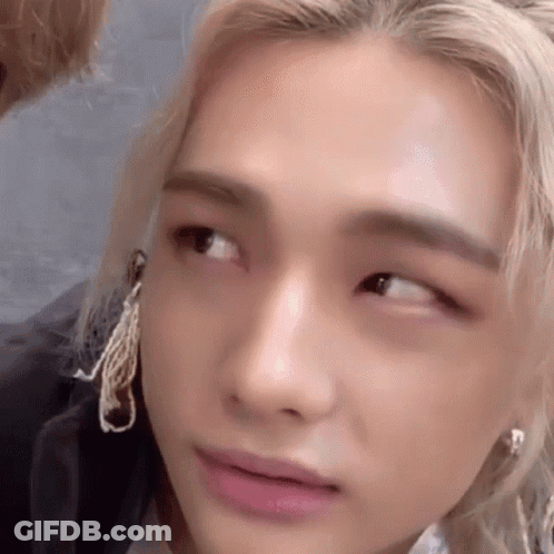 A Close Up Of A Person 'S Face With Their Eyes Closed And Their Mouth Open . GIF