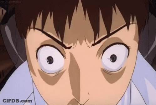 A Close Up Of A Person 'S Face With Their Eyes Wide Open And Their Mouth Open . GIF