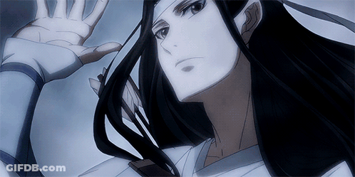 A Close Up Of A Person 'S Face With Their Hand Outstretched GIF