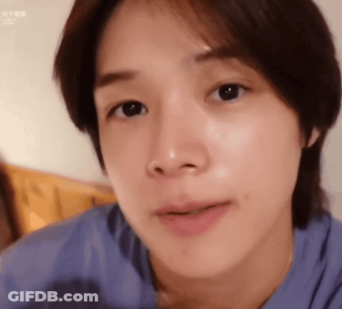 A Close Up Of A Person 'S Face With Their Mouth Open . GIF