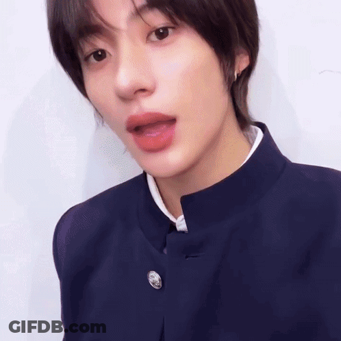 Close Up Of Person's Face With Open Mouth And Blue Jacket GIF