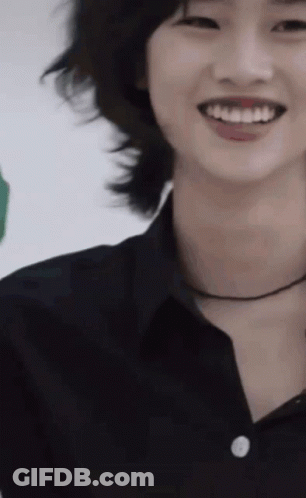 A Close Up Of A Person 'S Face With Their Mouth Open And Their Teeth Showing GIF