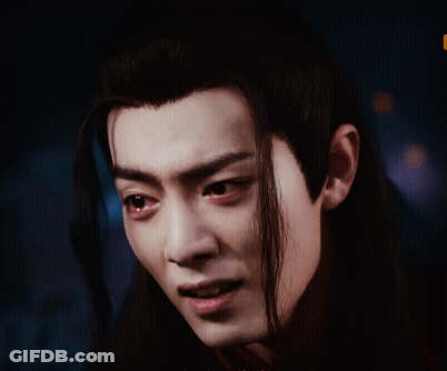 A Close Up Of A Person 'S Face With Their Mouth Open GIF