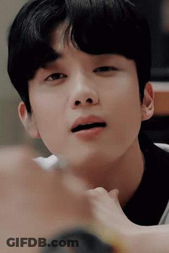 A Close Up Of A Person 'S Face With Their Mouth Open . GIF