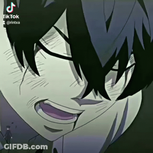 A Close Up Of A Person 'S Face With Tiktok Written On It GIF