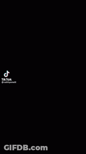 A Close Up Of A Person 'S Face With Tiktok Written On The Bottom Right GIF