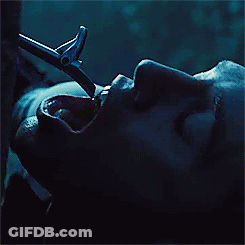 A Close Up Of A Person 'S Face With Water Coming Out Of It GIF