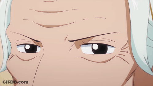 A Close Up Of A Person 'S Face With White Hair And A Black Eye GIF