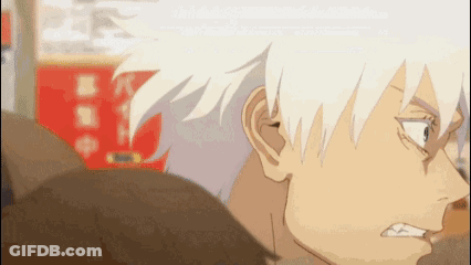 A Close Up Of A Person 'S Face With White Hair And A Serious Look On Their Face . GIF