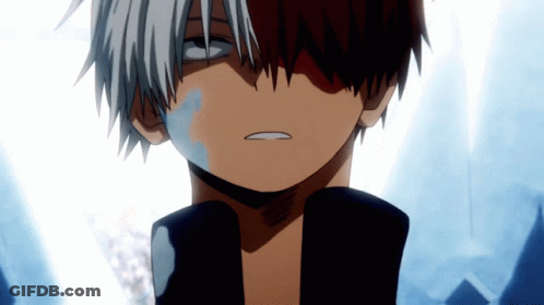 A Close Up Of A Person 'S Face With White Hair And Red Eyes GIF