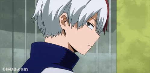 A Close Up Of A Person 'S Face With White Hair And Red Eyes GIF