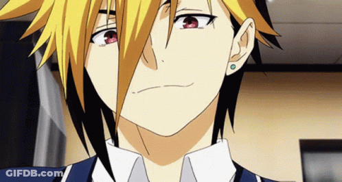 A Close Up Of A Person 'S Face With Yellow Hair GIF