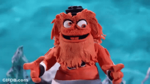 A Close Up Of A Person 'S Feet Wearing A Pair Of Black And Orange Shoes . GIF