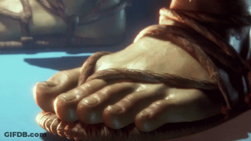 A Close Up Of A Person 'S Feet With Sandals On GIF