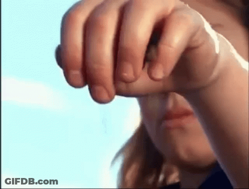 A Close Up Of A Person 'S Fist With A Bandage On It . GIF
