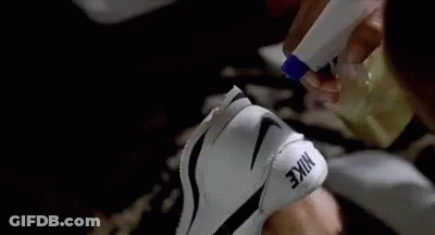 A Close Up Of A Person 'S Foot With A Nike Shoe On It . GIF
