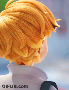 A Close Up Of A Person 'S Hair With A White Shirt GIF