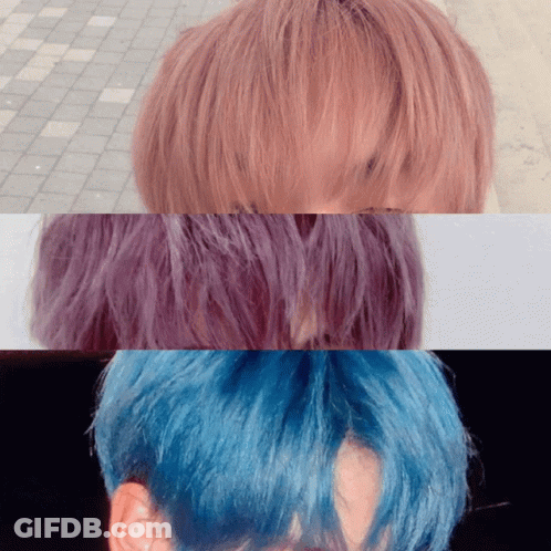 A Close Up Of A Person 'S Hair With Different Colors Including Pink Purple And Blue GIF