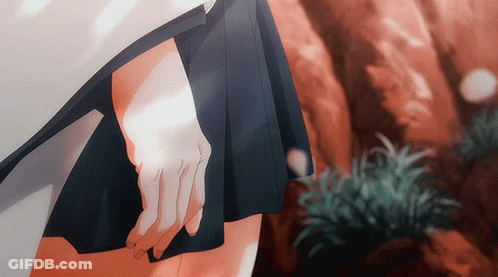 A Close Up Of A Person 'S Hand Holding A Piece Of Paper GIF