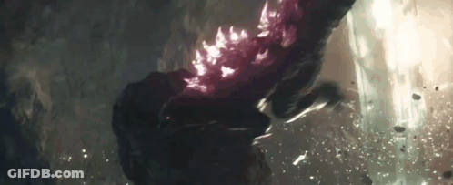 A Close Up Of A Person 'S Hand Holding A Purple Object . GIF