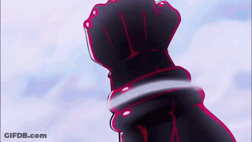 A Close Up Of A Person 'S Hand Holding A Sword In The Air . GIF