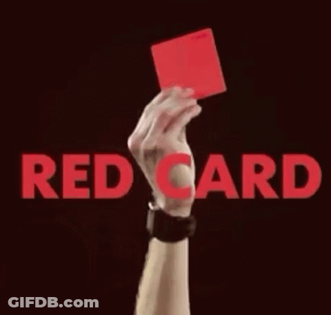 A Close Up Of A Person 'S Hand Holding Another Person 'S Hand In Front Of Red Letters . GIF
