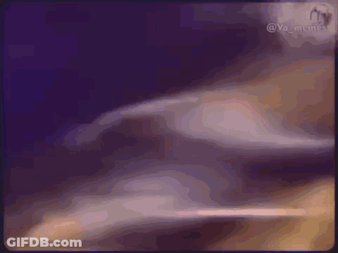 A Close Up Of A Person 'S Hand On A Blue Background . GIF