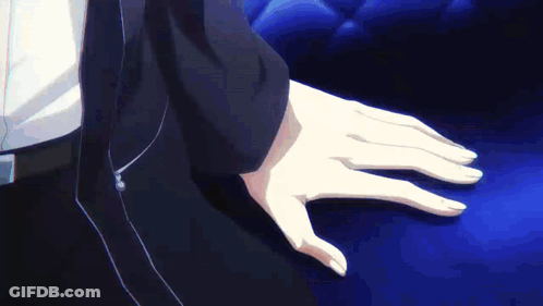 A Close Up Of A Person 'S Hand On A Blue Surface GIF