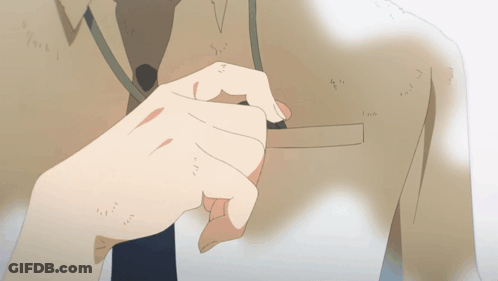 A Close Up Of A Person 'S Hand On A Shirt GIF