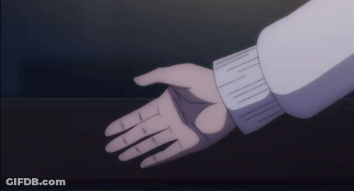 A Close Up Of A Person 'S Hand Reaching Out To Another Person 'S Hand GIF