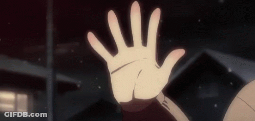 A Close Up Of A Person 'S Hand Reaching Out Towards The Camera . GIF