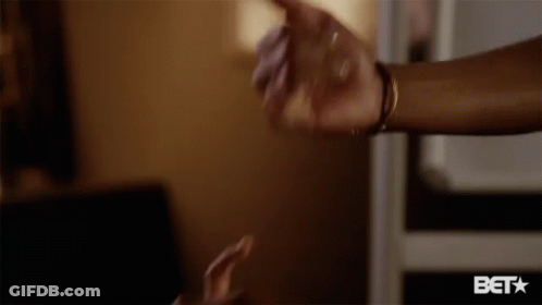 A Close Up Of A Person 'S Hand With A Bet Logo Below It GIF